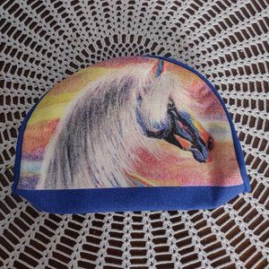 Hispanic Heritage Cosmetic pouch with art work by local artist.